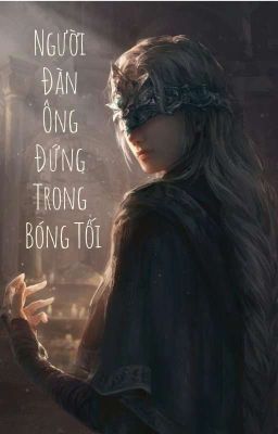 Người Đàn Ông Đứng Trong Bóng Tối